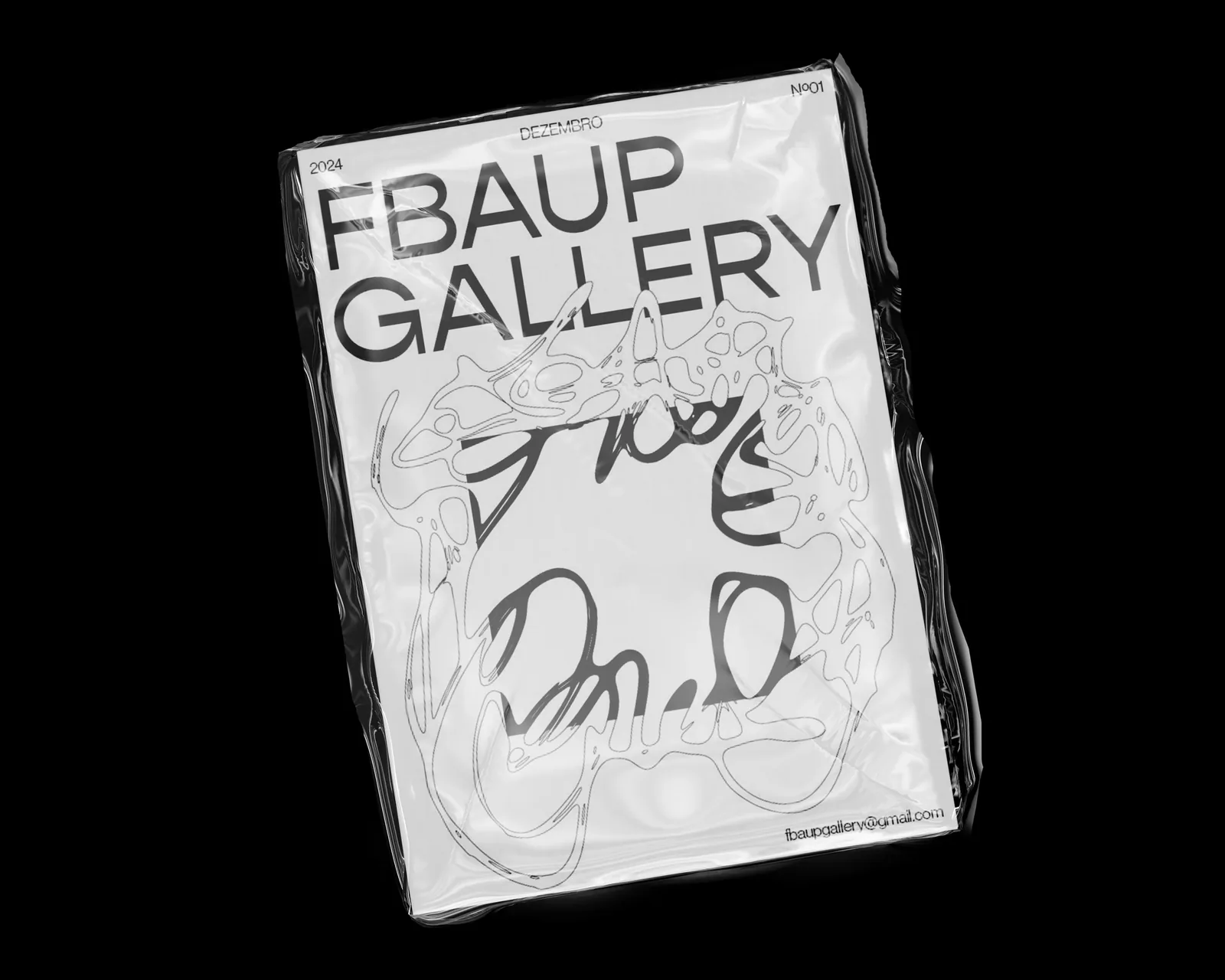 The fanzine cover wrapped in plastic, photographed on black
